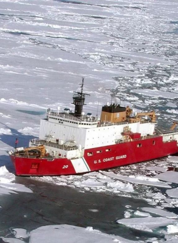ship on the ocean with ice